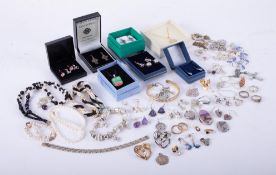 A mixed bag of costume jewellery including some silver items, freshwater pearl necklace, etc.