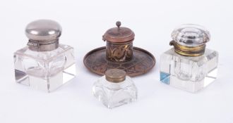 Three glass inkwells and another (4).
