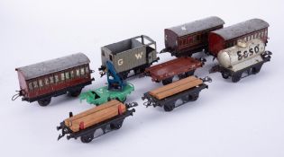 Hornby O gauge including carriages, fuel tanker, track, wagons etc.