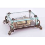 Reuge Music, Swiss table music box in glass case with dolphin supports.