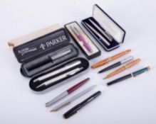 Thirteen pens to include Parker pens, Papermate, etc, some with original boxes.