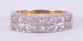 An 18ct yellow gold & platinum ring set with two rows of round cut diamonds, 6.05gm, size Q.
