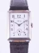 Asprey, a gent's rectangular silvered cased wristwatch, arabic enamel dial (some damage at 5 o'