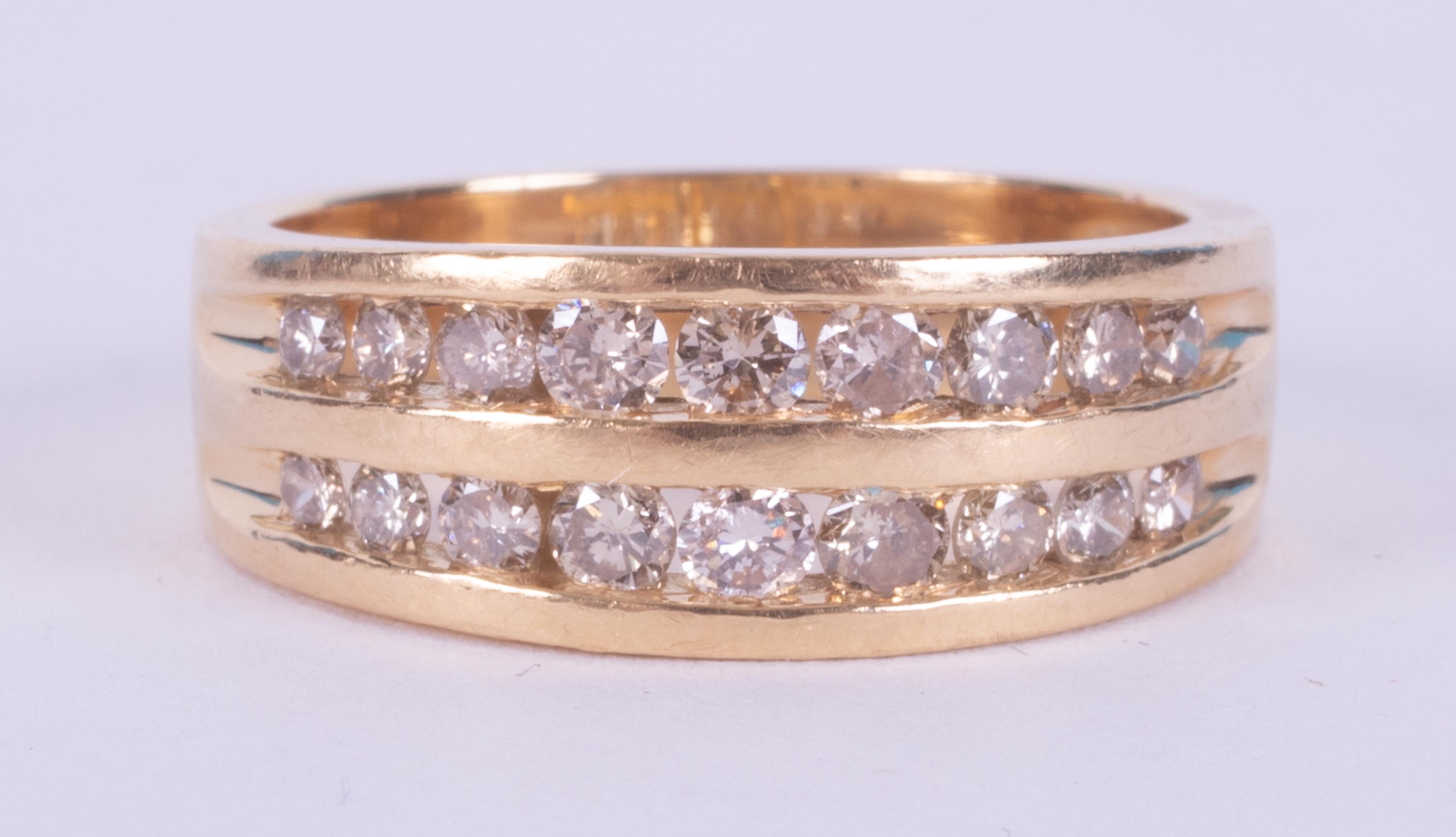 An 18ct yellow gold two row ring set with 0.75 carats of round brilliant cut diamonds, 5.82gm,