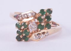 A 14k yellow gold cluster style ring set with approx. 0.09 carats of round cut diamonds and