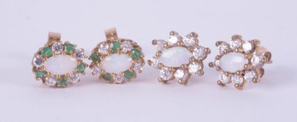 Two pairs earrings to include a pair of 9ct yellow gold cluster earrings set with a central white