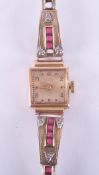 Ancre, a ladies Art Deco 18ct & 9ct yellow gold watch set with square cut synthetic rubies