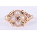 An antique yellow gold ring (not hallmarked or tested) set with pearls & small round cut emeralds,