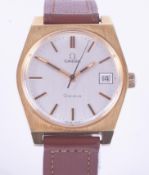 Omega, a 1974 gent's manual wind Omega Geneva with a gold plated case, silver dial with date, has