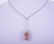 An 18ct white & rose gold cylindrical design pendant set with round cut rubies and round brilliant