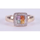 A 9ct yellow gold square cluster design ring set with four multi-colour sapphires surround