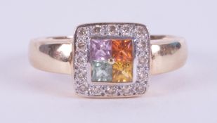A 9ct yellow gold square cluster design ring set with four multi-colour sapphires surround
