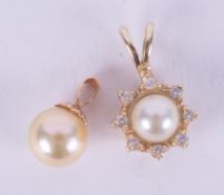 Two pearl set pendants, one 14k yellow gold in the design of a flower with the pearl set