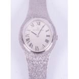 Universal Geneve, a ladies 18ct white gold Universal Geneve manual wind wristwatch, oval Roman dial,