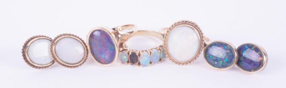 A selection of jewellery to include a 9ct yellow gold five stone ring set with oval cut black opals,