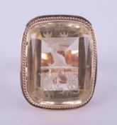 An impressive & ornate 9ct rose & yellow gold seal ring set with a pale yellow citrine engraved with