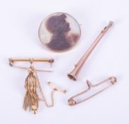 Four brooches to include a gold (no hallmarks) & mother of pearl cameo of a Roman Centurion?,