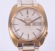 Bulova, a gent's gold plated Bulova Accutron Tuning Folk M9 with date day window,