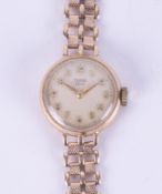 A ladies 9ct gold Tudor wristwatch, weight 13.7g.