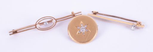 Three gold brooches to include an unhallmarked yellow gold circular brooch with a central star