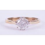 An 18ct yellow & white gold solitaire ring set with approx. 1.02 carats of round brilliant cut