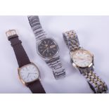 A selection of three wristwatches to include Timex, Next and a Seiko 5 Automatic.