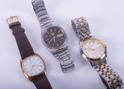 A selection of three wristwatches to include Timex, Next and a Seiko 5 Automatic.