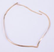 A 9ct yellow gold flat herringbone 'V' shaped necklace (broken & needs repairing), length 17", 4.