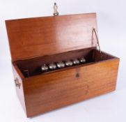An antique cylinder music box with rack of six bells, cylinder 14 inches, damage to the comb,