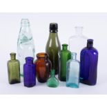 Nine various vintage glass bottles including G.C.Bryant, Devonport.
