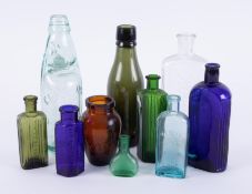 Nine various vintage glass bottles including G.C.Bryant, Devonport.