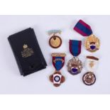 A collection of Masonic jewels, two silver gilt medals including Hawton Lodge 100.