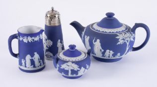 Wedgwood jasperware teapot and three other pieces, not all marked.