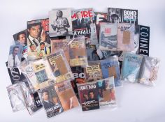 A collection of various Ian Fleming, James Bond paperbacks and other James Bond memorabilia