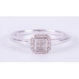 A 9ct white gold square cluster style ring set with a mixture of princess cut and round brilliant