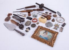 An interesting collection of vintage tools, a bulls head tin opener, various souvenir items, general