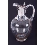 A silver & glass claret jug, makers mark J.G & S with emblem engraved on the lid (no. 43), height