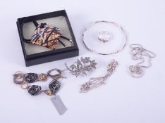 A selection of costume jewellery & silver jewellery to include a silver twist bangle, silver