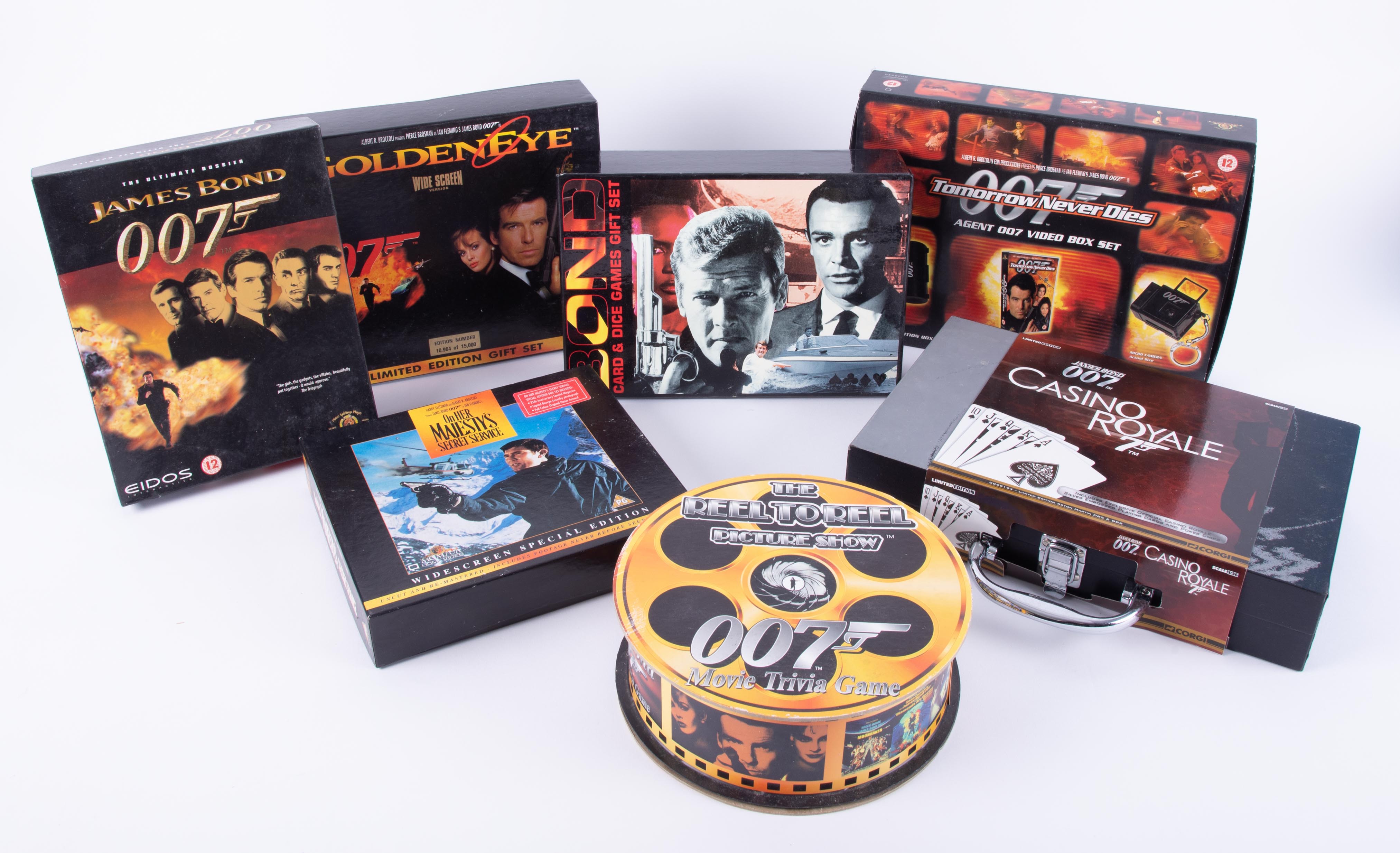 Various James Bond collectables including video box set, Golden Eye edition set, reel to reel