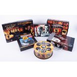 Various James Bond collectables including video box set, Golden Eye edition set, reel to reel