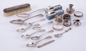 A collection of silverwares mainly including Victorian silver teaspoons, silver backed clothes