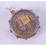 An enamelled sixpence.