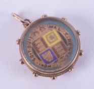 An enamelled sixpence.