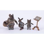 Beatrix Potter miniature bronze figures, (3) and a music stand, the tallest 30mm.