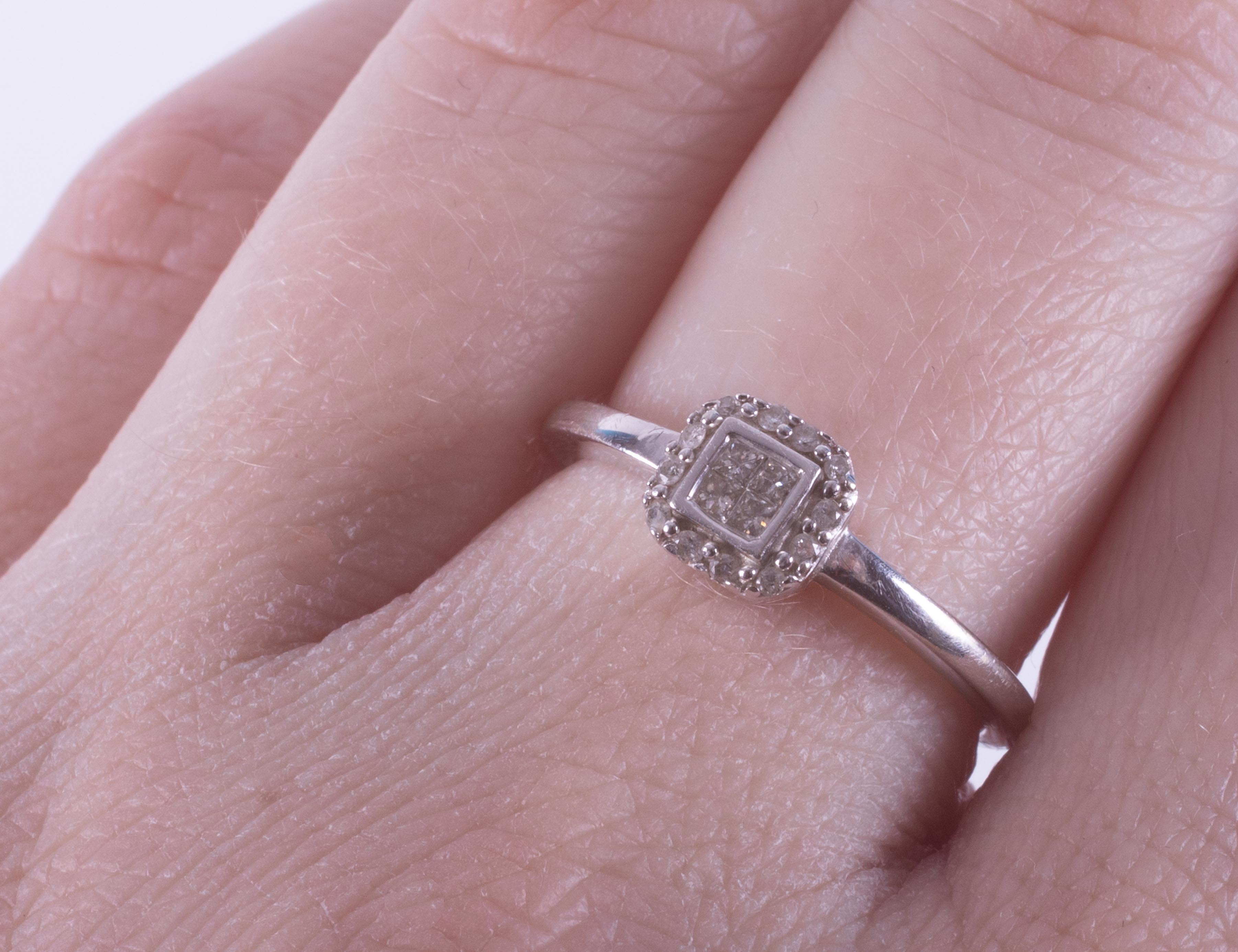 A 9ct white gold square cluster style ring set with a mixture of princess cut and round brilliant - Image 3 of 3