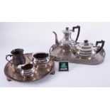 A silver plated tea service and tray, together with a baluster tankard and another tray.