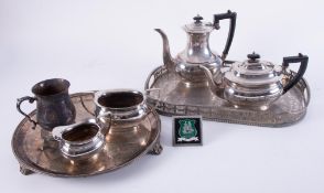 A silver plated tea service and tray, together with a baluster tankard and another tray.