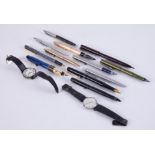 A collection of various pens including an Osmiroid left hand fountain pen, Parker pens, also a