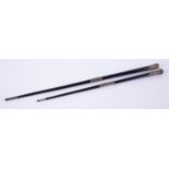 Two antique silver mounted and ebonised conductors batons, the longest 52cm.