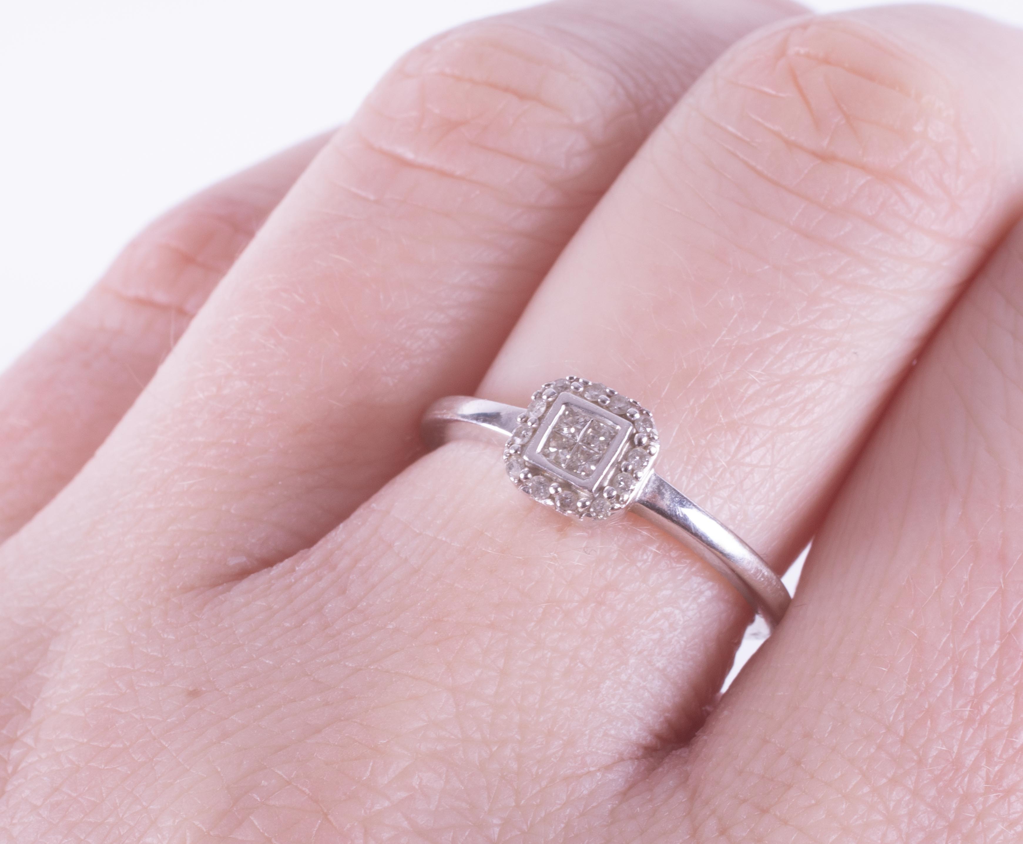 A 9ct white gold square cluster style ring set with a mixture of princess cut and round brilliant - Image 2 of 3